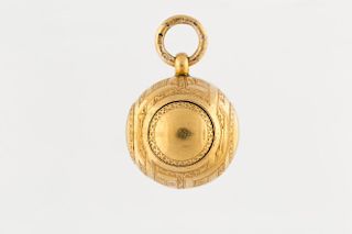 [FABERGE] AN ANTIQUE RUSSIAN GOLD BALL LOCKET PENDANT, MARKED KF IN CYRILLIC FOR KARL FABERGE, MOSCOW, 1908-1917