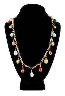 [FABERGE] AN ANTIQUE RUSSIAN GOLD NECKLACE WITH NINETEEN JEWELED, HARDSTONE AND ENAMEL EGG PENDANTS, VARIOUS MAKERS INCLUDING