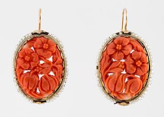 A PAIR OF ANTIQUE GOLD AND CARVED CORAL EARRINGS WITH SEED PEARLS