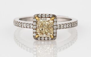 A YELLOW DIAMOND RING SET IN WHITE GOLD