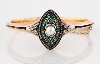 A GOLD BANGLE BRACELET WITH DIAMONDS, EMERALDS AND A PEARL, FRANCE