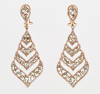 A PAIR OF ARTICULATED ROSE GOLD EARRINGS WITH COLORED DIAMONDS