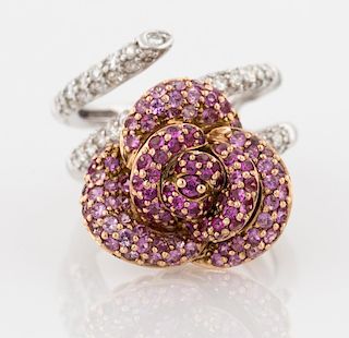 A DIAMOND-SET WHITE AND YELLOW GOLD FLOWER RING