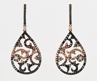 A PAIR OF ROSE GOLD EARRINGS WITH BLACK AND BROWN DIAMONDS