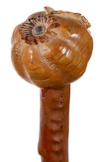 332. Carved Nut Folk-Art Cane – Ca. 1900 – A carved tagua nut handle natural twigspur and grotesque grown shaft and a met