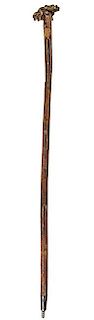 341. Skull and Snake Folk-Art Cane – Ca. 1880 – An unusual carved handle with a large snake wrapped around a group of bon