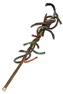 346. Folk-Art Snake Cane – Dated 1992 – The picture tells the story. O.L. 40” / $250-$500
