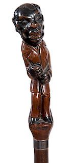 357. African American Folk-Art Cane – Ca. 1920 – A beautiful full-figured carving of a gentleman with small two-colored g