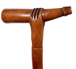 364. Powder Horn Folk-Art Cane – Ca. 1870 – A carved hand holding a powder horn. Hardwood shaft and missing ferrule.  Han