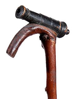 365. Cannon Folk-Art Cane – Ca. 1880 – A very nicely carved cannon with some paint decoration atop a full bark twigspur s
