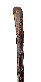368. Hanging Folk-Art Cane – Ca. 1860 – An unusual subject matter with a gentleman hanging from a tree branch with a dog
