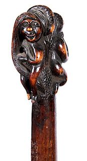 372. Adam and Eve Folk-Art Cane – Ca. 1875 – A nice stylized carving of Adam and Eve in full frontal positions and a snak