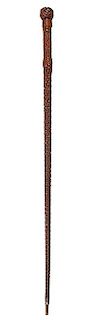 389. Nautical Carved Folk-Art Cane – Ca. 1865 – A fully carved hardwood shaft with a Turks knot handle and various high-r