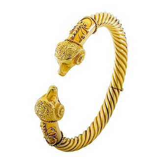 ARCHAEOLOGICAL REVIVAL STYLE HINGED YELLOW GOLD BANGLE