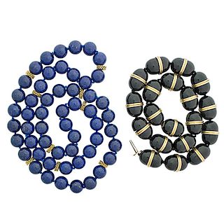 TWO STRANDS OF LAPIS OR ONYX & YELLOW GOLD BEADS