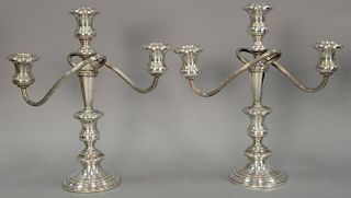 Pair of Fisher sterling silver candelabras with weighted base. ht. 12in.