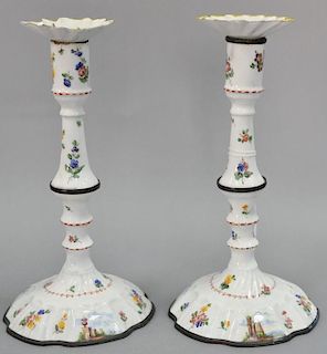 Pair of French enamel on copper candlesticks, polychrome decorated with cartouches, 19th century. ht. 9 1/2in.