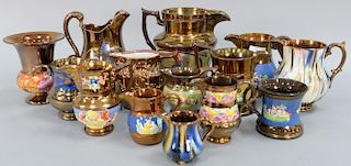 Fourteen copper luster pieces including pitchers, creamers, sugar, and a vase. ht. 3 1/2in. to 8 1/2in.