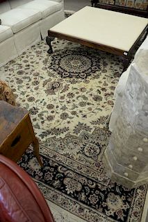 Oriental room size carpet, cream ground with blues and tans. 9' x 12'