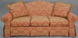Henredon red and tan paisley upholstered sofa having rolled arms and back. lg. 88in.