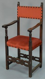 Italian style armchair with carved rosette stretcher.