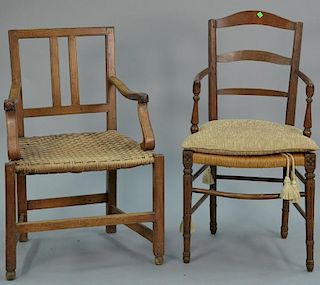 Two Continental walnut armchairs with rush seats.