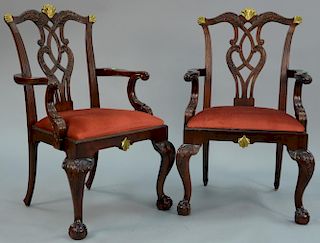 Pair of Chippendale style armchairs with ball and claw feet.