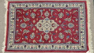 Two rugs including Oriental throw rug and a contemporary sculptued rug.  2'1" x 3'3"