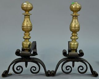 Italian Rococo pair of large heavy brass andirons on iron bases, antique brass on modern bases. ht. 21in.