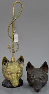 Two fox mask door stops including one iron (ht. 5 1/2in.) and one heavy brass with fox mask having crop handle (ht. 18in.)