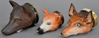 Three fox masks including rare 19th century English porcelain fox mask stirrup cup gilt collar and titled "Tally Ho" (repaire