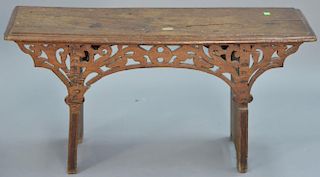 Continental walnut bench with reticulated carved front. ht. 17 1/2in., top: 11" x 35 1/2"