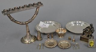 Group of silver and sterling to include miniature bowls, tray, plates, flatware, salt and pepper, silver figure seated on lio