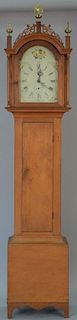Federal tall clock having painted wood tombstone dial and wood works with weights and pendulum, circa 1800. ht. 90in.