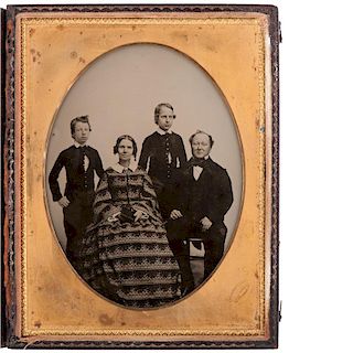 Mathew Brady, Half Plate Ambrotype of a Family, the Mother Holding a Cased Image