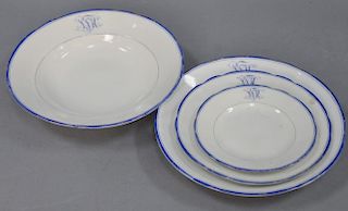 KPM porcelain partial dinner set with blue rim border and monogram, KPM mark on bottom, 19th century, 36 pieces.