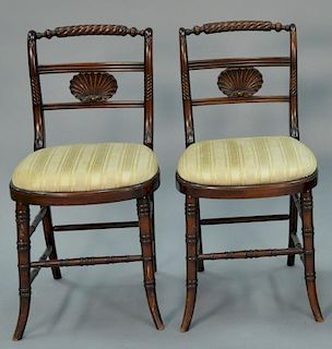 Pair of Regency mahogany side chairs with shell carved backs on faux bamboo turned legs.