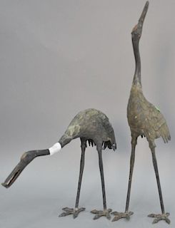 Pair of bronze cranes. ht. 13in. & 24 1/2in.