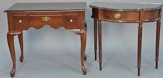 Two piece lot to include Contemporary lowboy (ht. 30in., wd. 34in.) and one drawer demilune game table (ht. 30in., top: 16" x