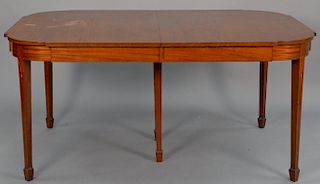 Margolis Federal style dining table with D shaped ends on square tapered legs with two 12inch leaves.
(top finish as is). 
ht