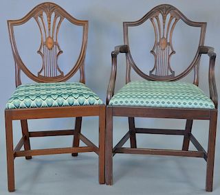 Set of twelve style mahogany dining chairs with inlaid panel backs and various upholstered seats includes two armchairs and t