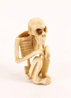 Ivory Crouching Skeleton Form Okimono, 19th/20th C