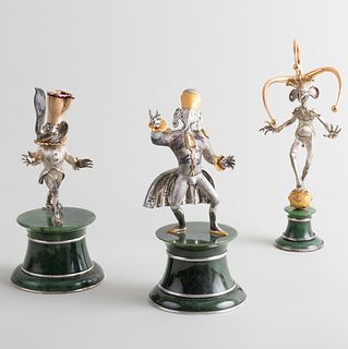 Mikhail Chemiakin (b. 1943): Group of Three Sterling Silver, Gold and Serpentine Carnival Figures