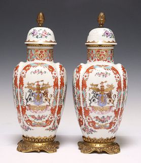(2) DECORATIVE GILT-METAL MOUNTED PORCELAIN ARMORIAL VASES & COVERS