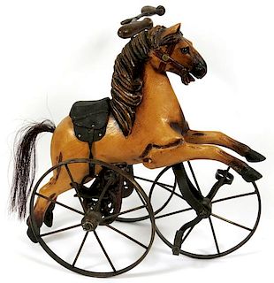 WROUGHT IRON & CARVED WOOD HORSE FORM TRICYCLE