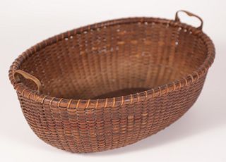Oval Nantucket Basket with Two Heart Carved Handles, early 20th Century