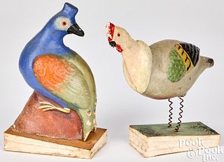 Two painted composition bird squeak toys