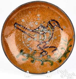Pennsylvania redware bird plate, early 19th c.