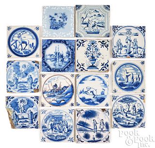 Fourteen Delftware blue and white tiles, 18th c.