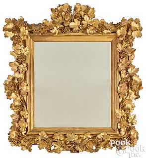 Large carved giltwood mirror, 19th c.